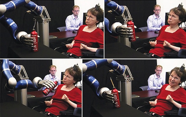 Une femme paralysée contrôle un bras robotique avec son esprit.
